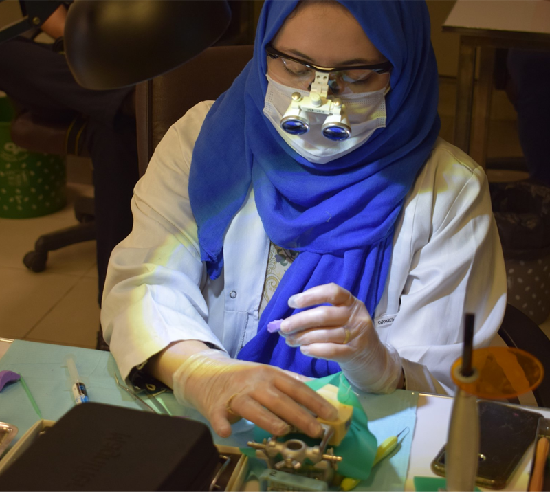 Dentist working in clinic